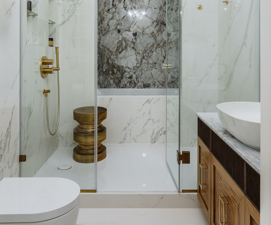 The combination wood and marble contact paper in the bathroom