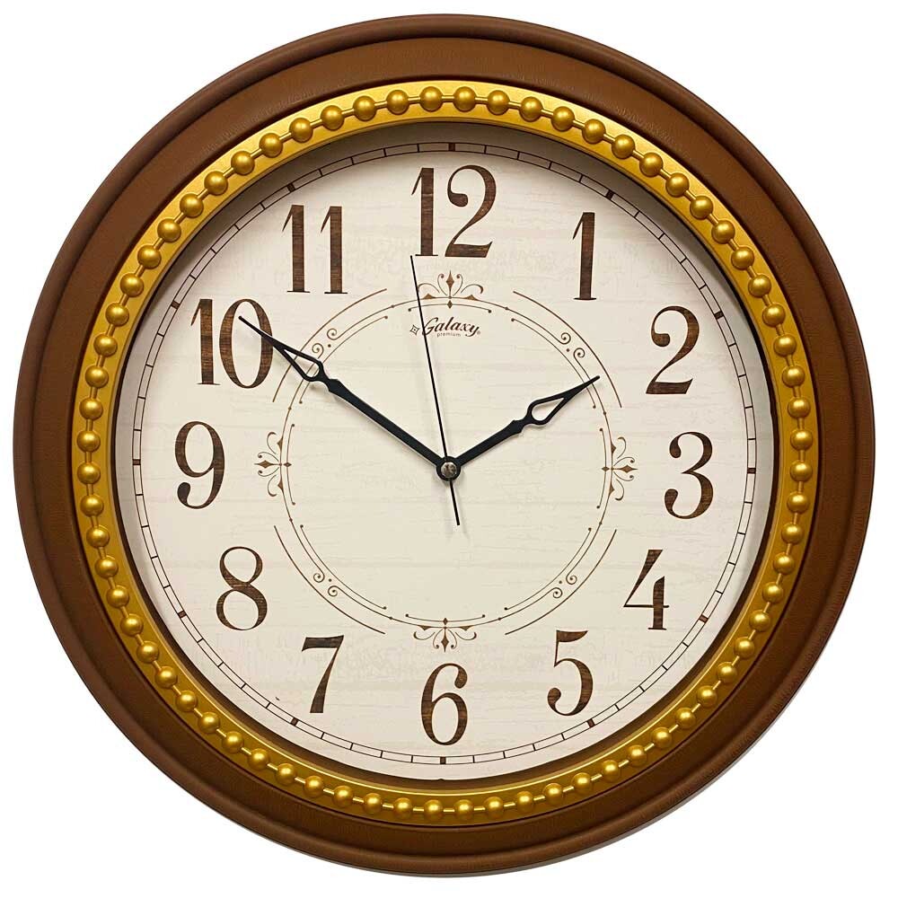 Часы настенные пластиковые коричневые с золотой патиной 1974-Х
