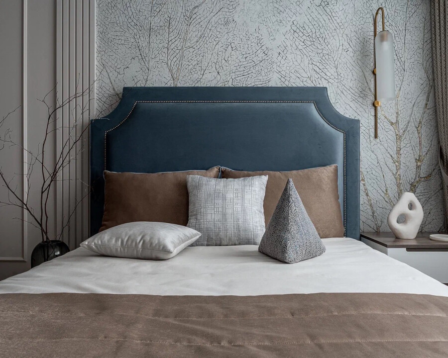 The bed is gray-blue