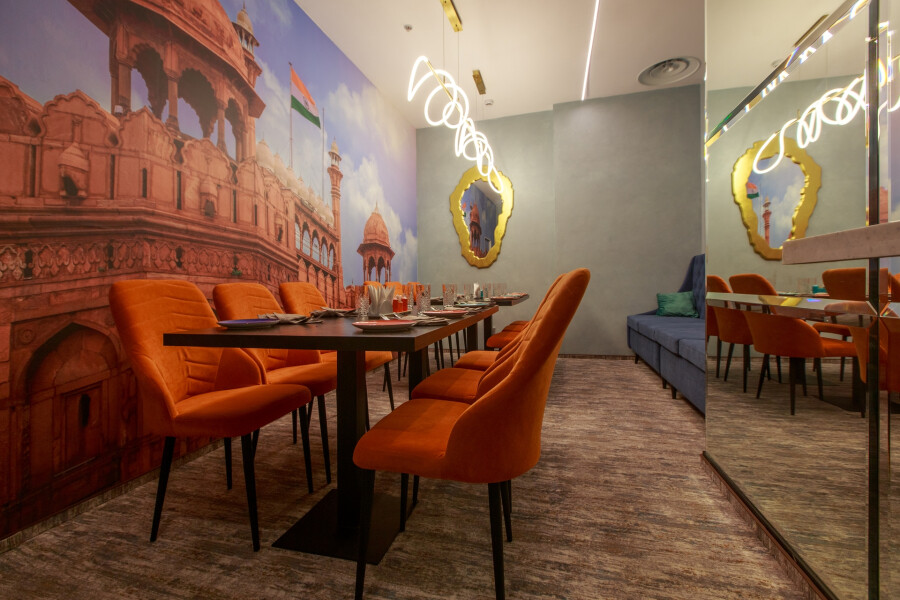 Orange chairs in the VIP hall